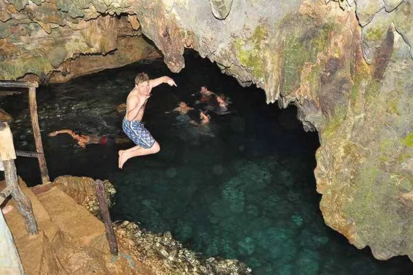 guy jumping on the cave best punta cana tours